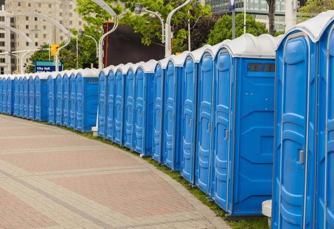 a row of portable restrooms ready for eventgoers in Brookline, MA